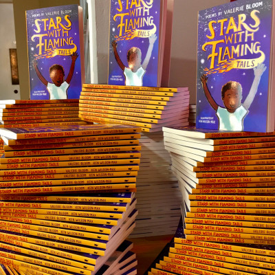 Every child attending Valerie Bloom's performance at the Wolverhampton Grand received their own copy of *Stars with Flaming Tails*