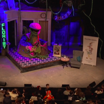 Children excitedly waiting for Michael Rosen to come on stage