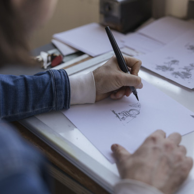 Benji Davies drawing at his desk