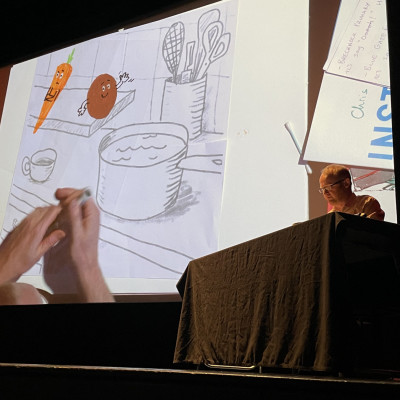 Chris drawing live at his event at the French Institute in London