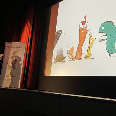 Chris Naylor-Ballesteros on stage at the French Institute in London