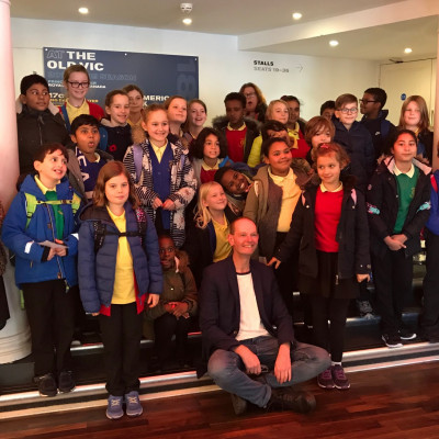 Daniel with a class of children, after his performance at The Old Vic