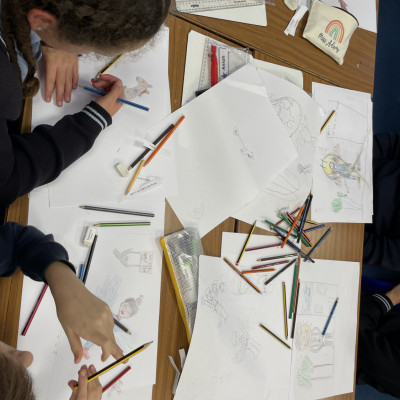 Children participating in Elina Braslina's illustration workshop