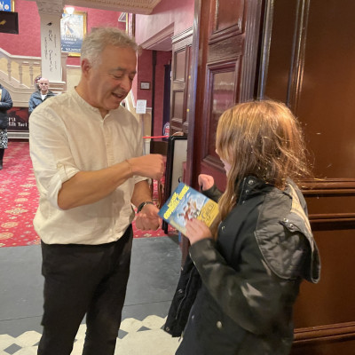 Frank Cottrell-Boyce helped the Children's Bookshow team hand out free copies of *Noah's Gold* after his performance at Newcastle Theatre Royal