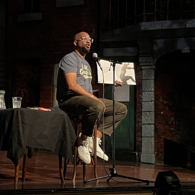 Kwame finished his performance by reading his book *The Undefeated*.