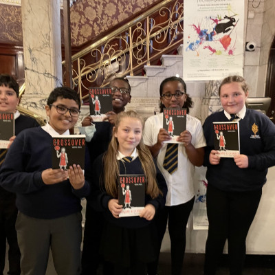 Children were excited to receive their own copy of *The Crossover*