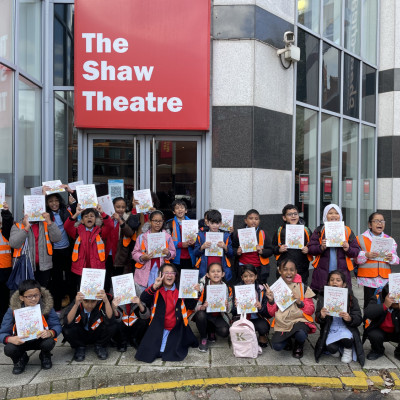Some of the children attending Michael's performance with their free books!