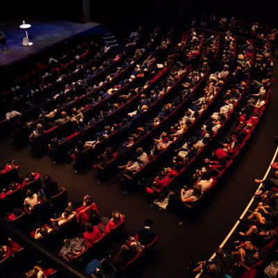 Audience listening to Michael Rosen at The Curve theatre
