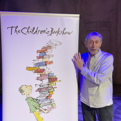 Michael Rosen with the Children's Bookshow banner!