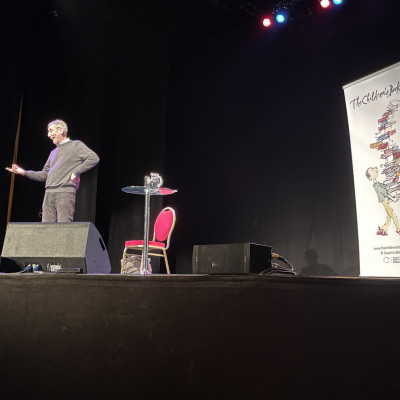 Michael Rosen on stage at Peterborough New Theatre 2023