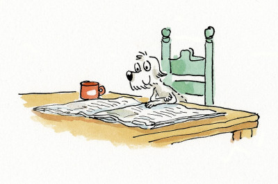 Shola reading the newspaper