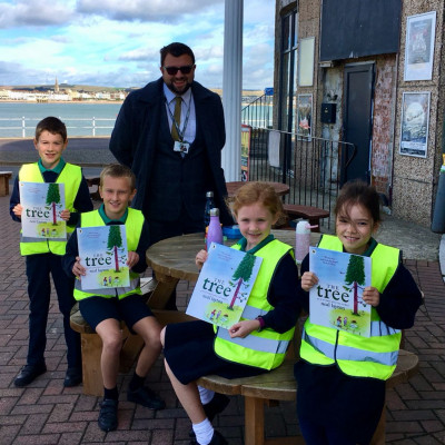 Some of the school children with their books