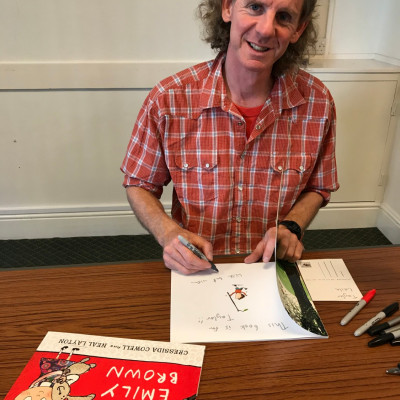 Neal signs books after the show