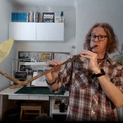 Neal playing his stick saxophone during his Digital Festival event