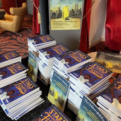 We gave every child attending Valerie Bloom's performance a free copy of her latest book, *Stars with Flaming Tails*