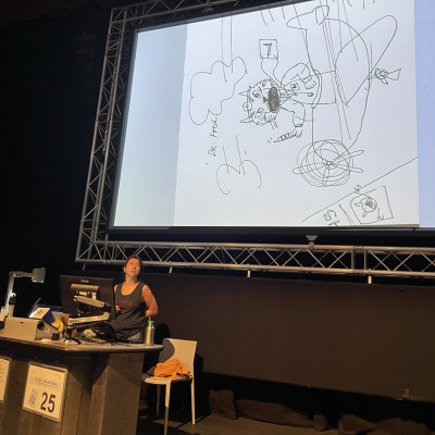 Yasmeen Ismail drawing live on stage at the Northcott theatre in Exeter 2023